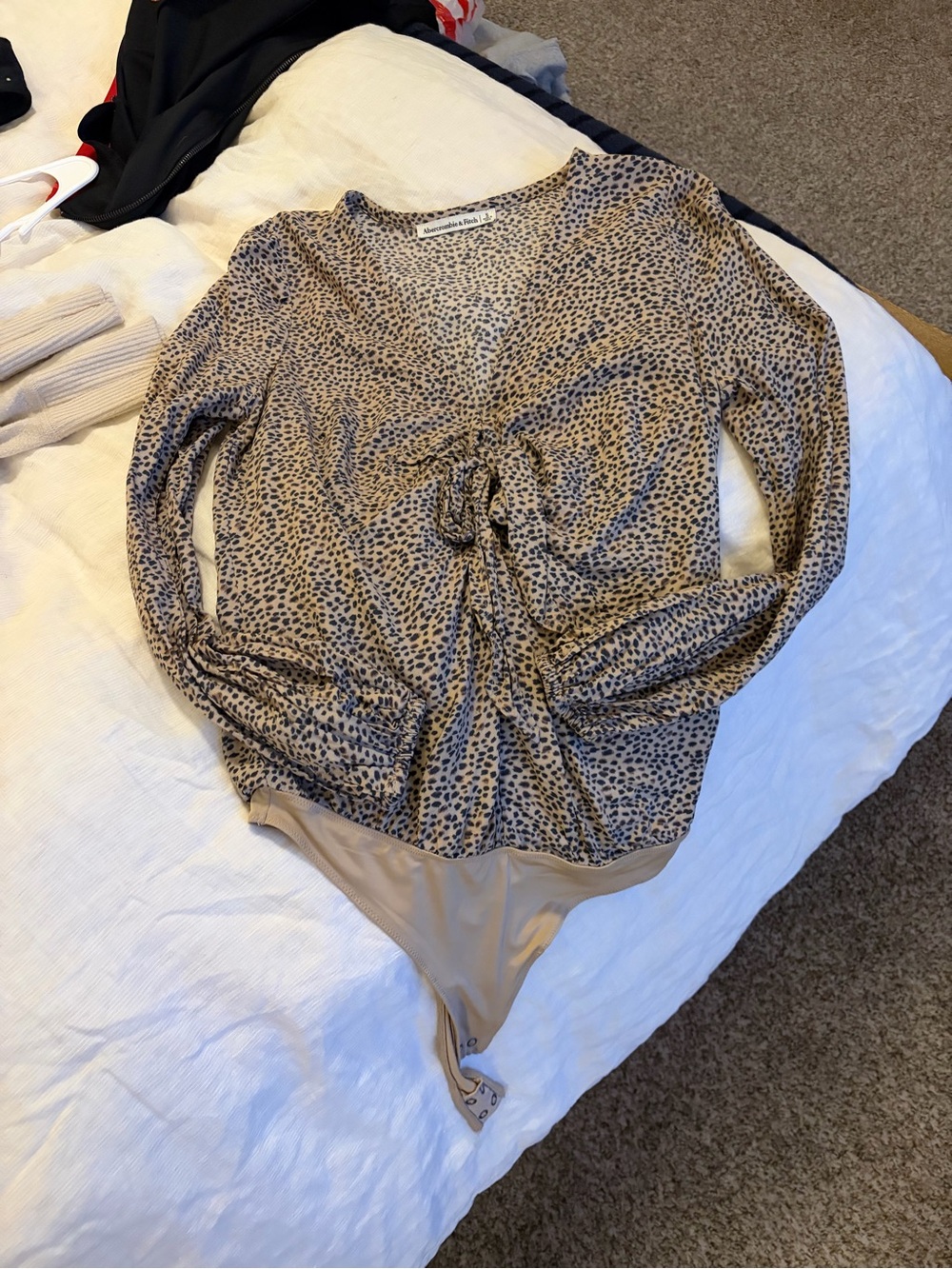 Abercrombie &Fitch Leopard Print Long-Sleeve Bodysuit with keyhole/bow detail.